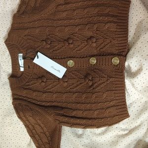 Brown knit baby sweater